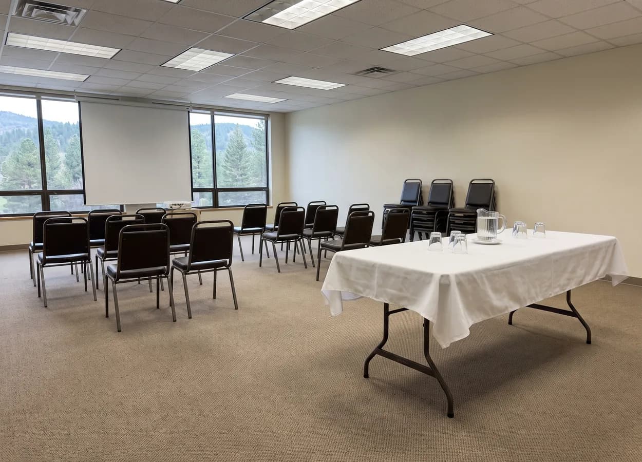 empty seminar room being set up for a collision repair event