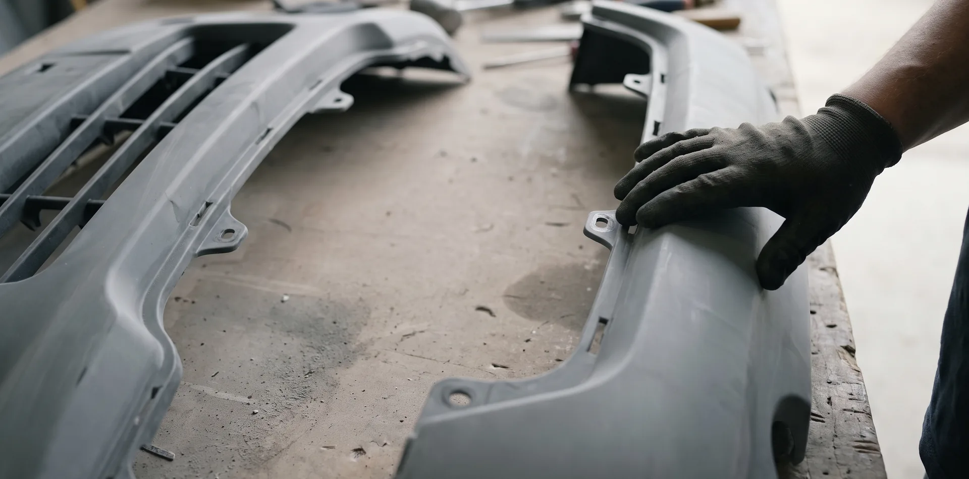 close-up comparing OEM and aftermarket crash parts